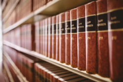 Law books on a shelf.