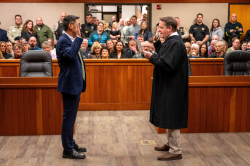 Commissioner Chang taking the oath of office on Jan. 6, 2025