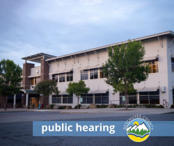 public hearing graphic with image of Deschutes Services Building