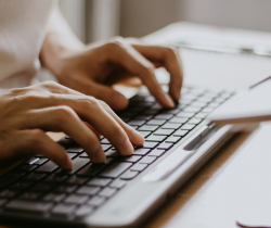 picture of person typing on keyboard