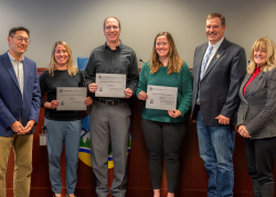 Picture of finance team being recognized with BOCC