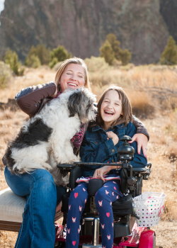 Happy people and dog photo