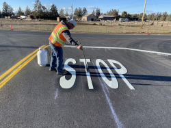 This week’s photo shows pavement legend installation on NE Maple Avenue in Redmond.