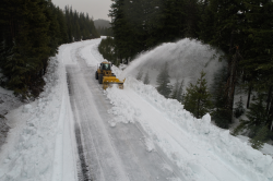 This week’s photo is an archived photo of snow removal on Cascade Lakes Highway.