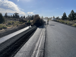 construction of asphalt pavement on Alfalfa Market Road