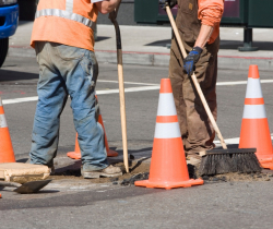 Stock photo of road construction workers