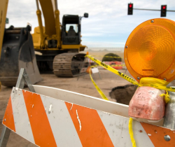 Photo of road construction equipment and barrier