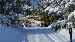 archived photo of snow plowing operations near Bend
