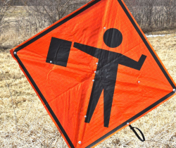 Photo of a flagger ahead sign