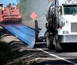 archive photo of chip sealing in south Deschutes County