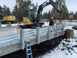This week’s photo shows bridge rail installation occurring on Gribbling Rd.